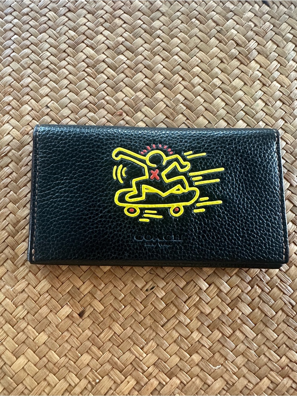Coach Black Leather Wallet with Yellow and Red Skateboard Graphic